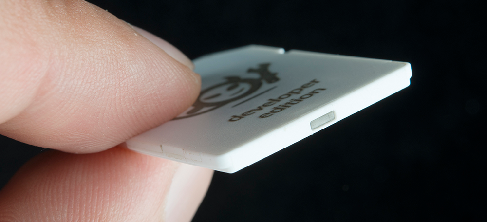 The light sensor is just behind the translucent window